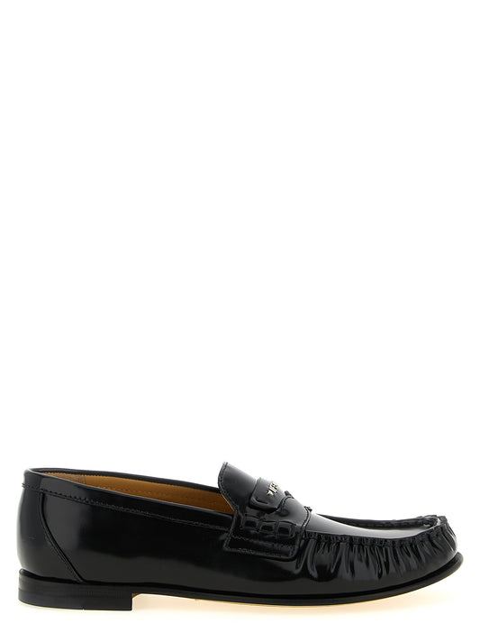 Mustat vasikannahkaiset slip-on-loaferit