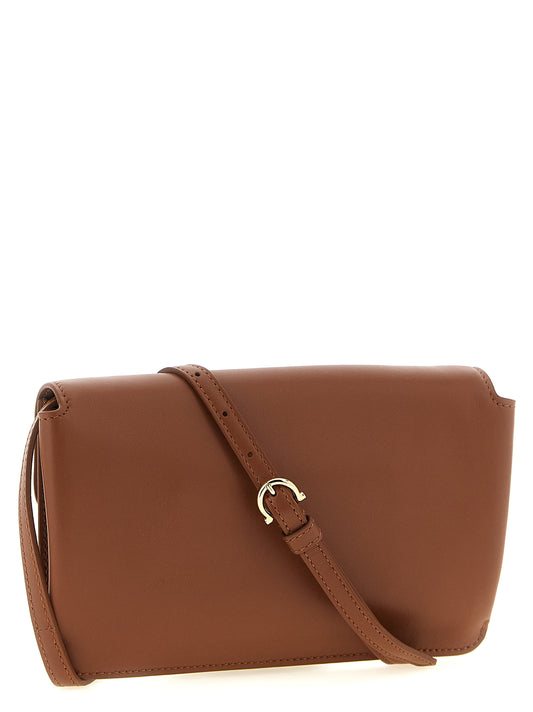 Ruskea vasikannahkainen clutch-laukku