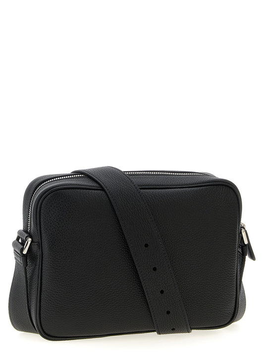 Musta vasikannahkainen crossbody-laukku