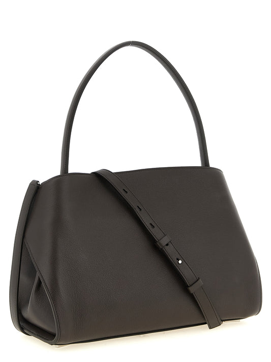 Ruskea vasikannahkainen olkalaukku